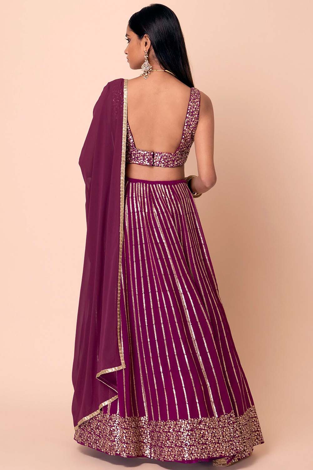 Raina Wine Georgette Sequins & Gold Zari Embroidered Lehenga Saree