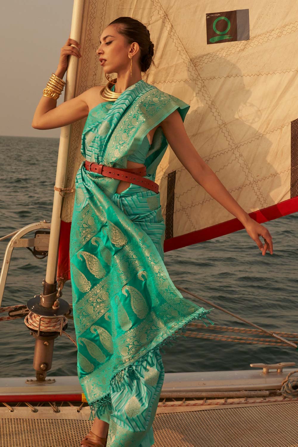 Shop Kingston Turquoise Satin Nylon Two Tone Weaving Saree at best offer at our  Store - One Minute Saree