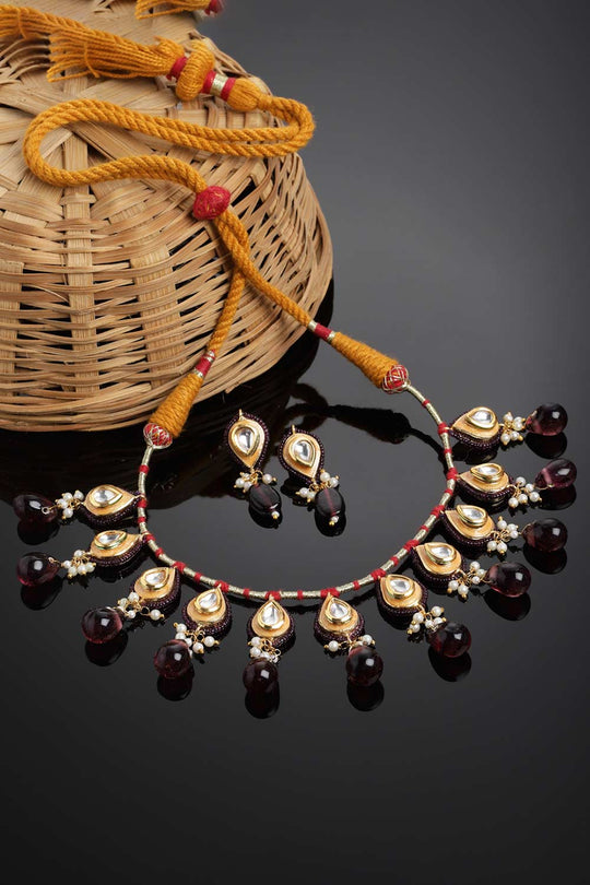 Shop Marella Purple & Gold Kundan with Pearls Necklace and Earrings Set at best offer at our  Store - One Minute Saree